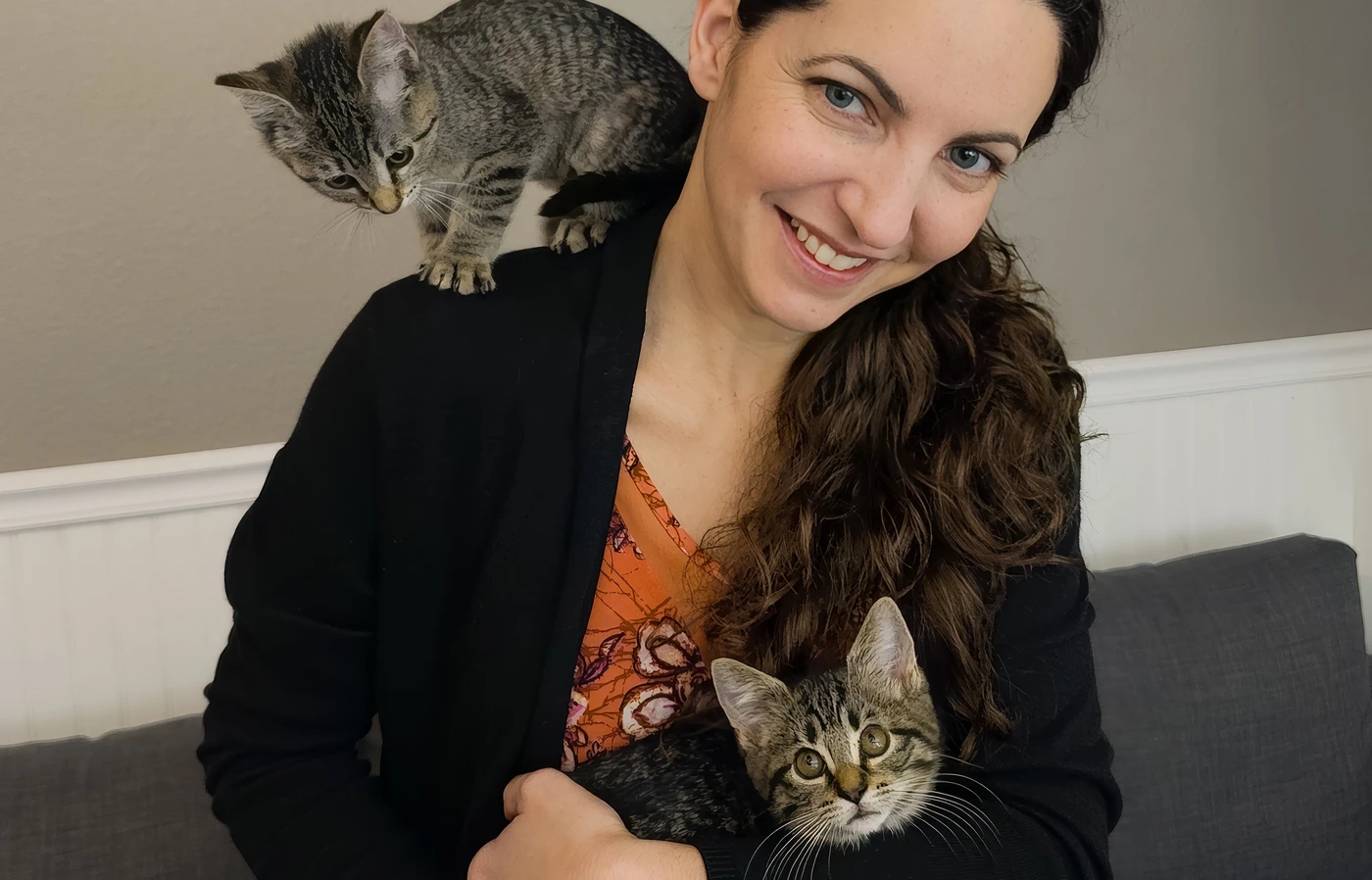 Portrait of researcher with two kittens