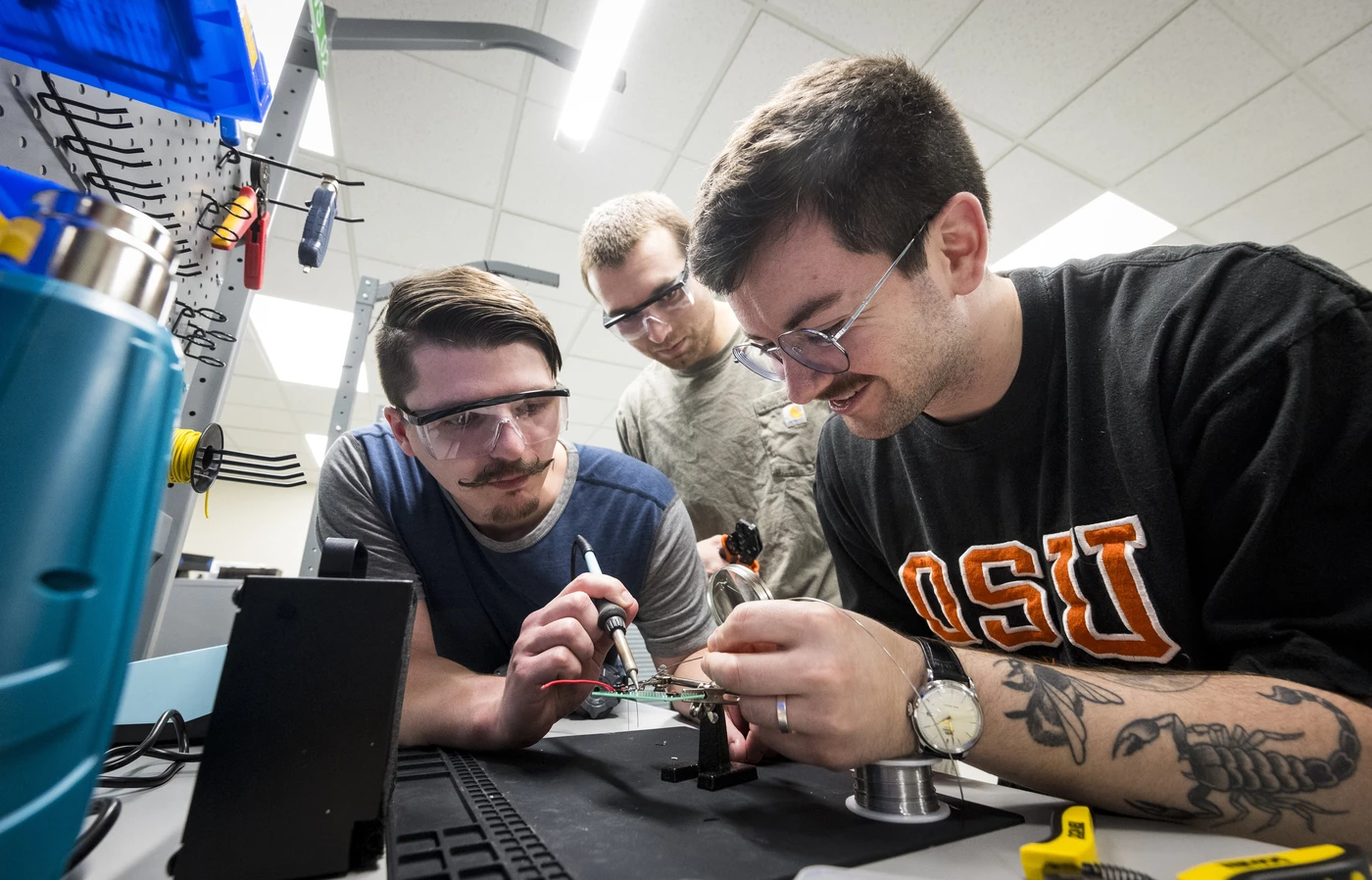 Students working on technology in lab