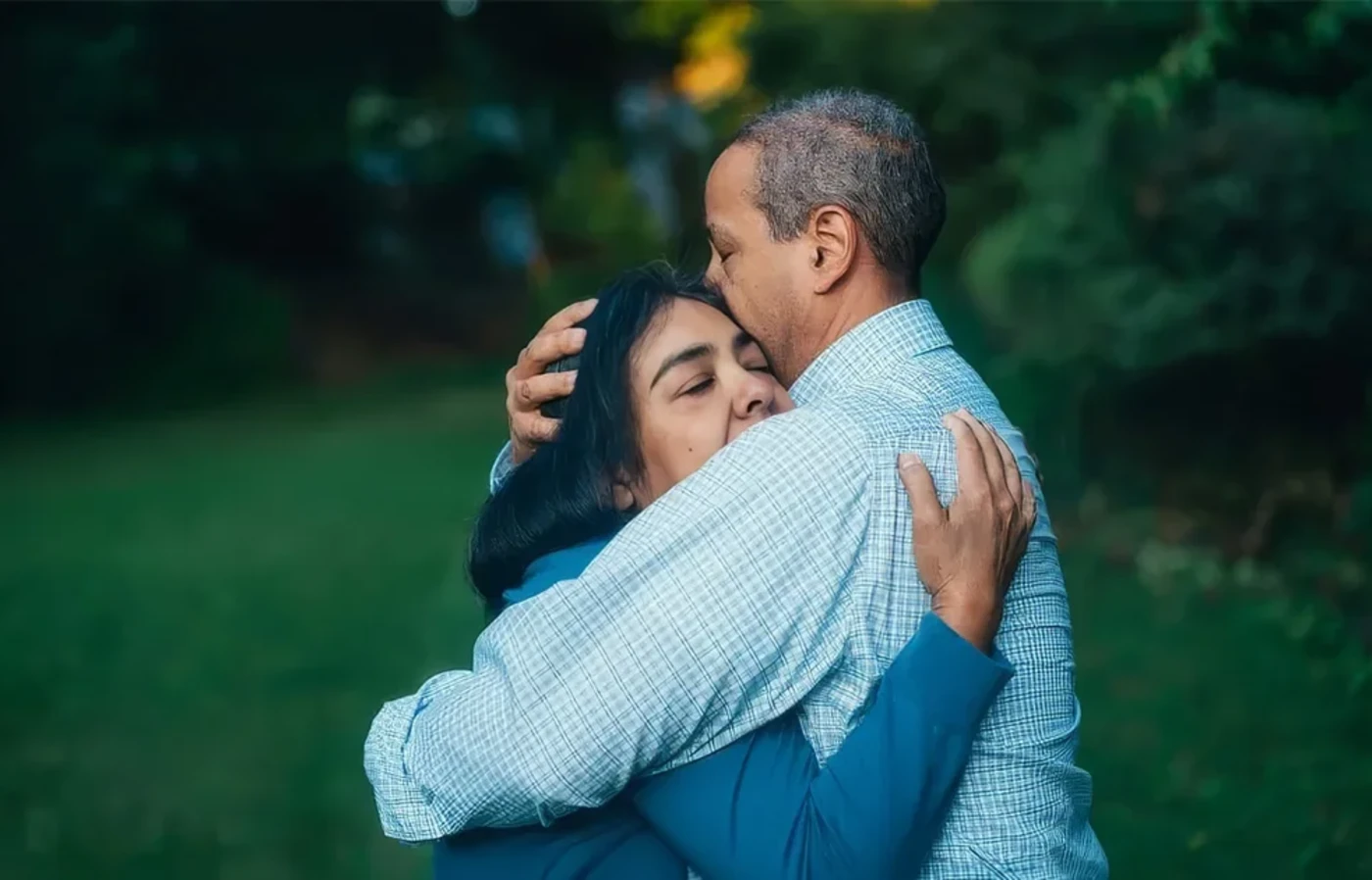 Two people hugging
