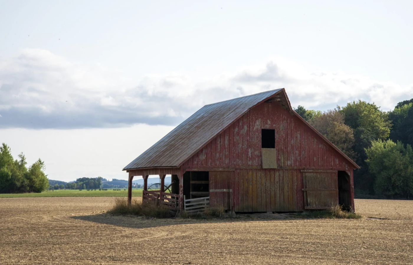 Red barn in field