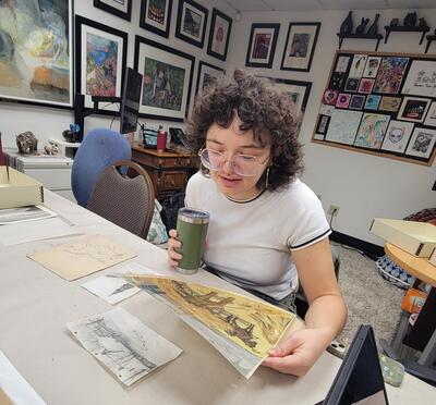 Student looking at drawing