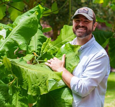 portrait of man with plant