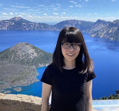 Researcher standing near Crater Lake