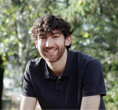 Outdoor headshot of Tias Carney