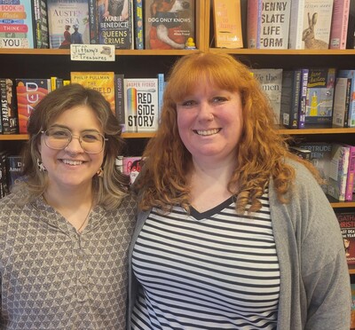 Two of the three new owners of Grass Roots Books