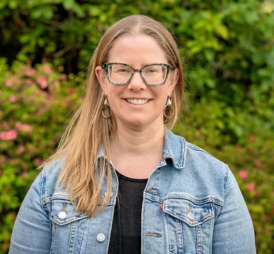 Researcher smiling