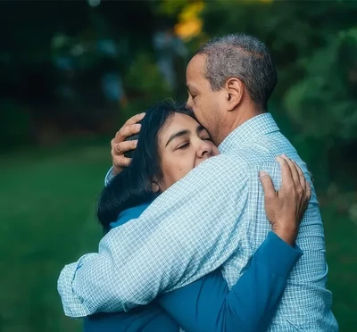 Two people hugging