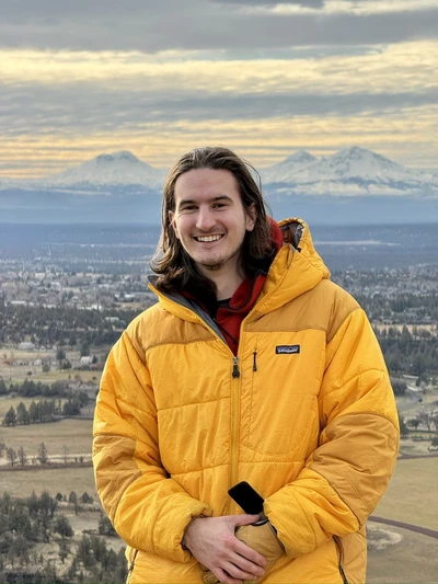 Portrait of student in yellow jacket