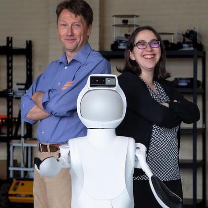 Bill Smart and Naomi Fitter with a Quori robot. Photo by Shivani Jinger.