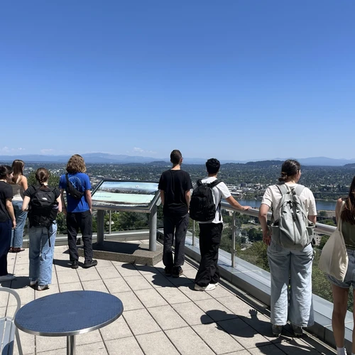 Students looking out over Portland from the OHSU campus.