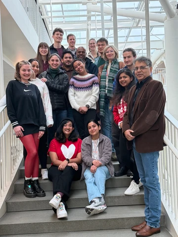 Group of researchers on staircase