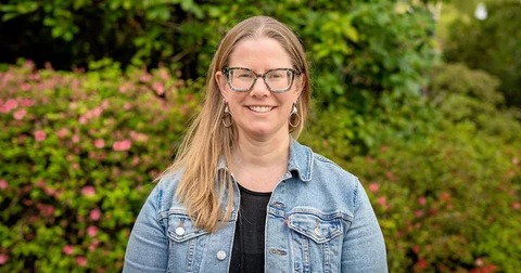 Researcher smiling