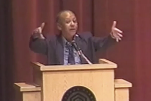 Speaker at lectern