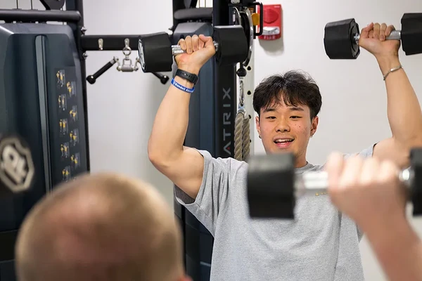 Student with weights
