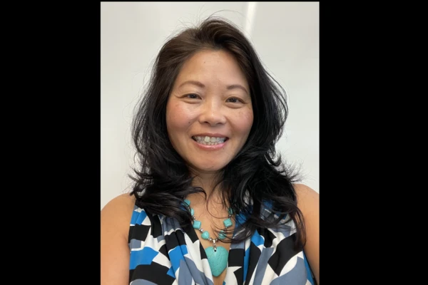 Headshot of Amanda Kha smiling.