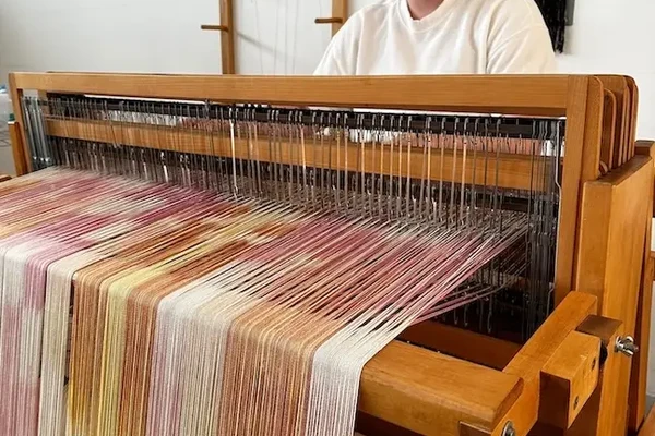 Person at loom