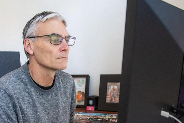 Researcher at computer