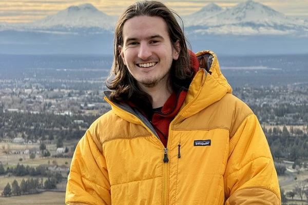 Portrait of student in yellow jacket