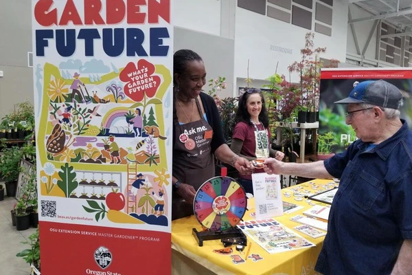 Master gardeners at booth