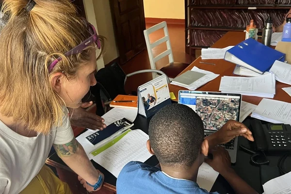 Researcher with child