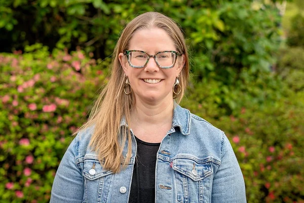 Researcher smiling